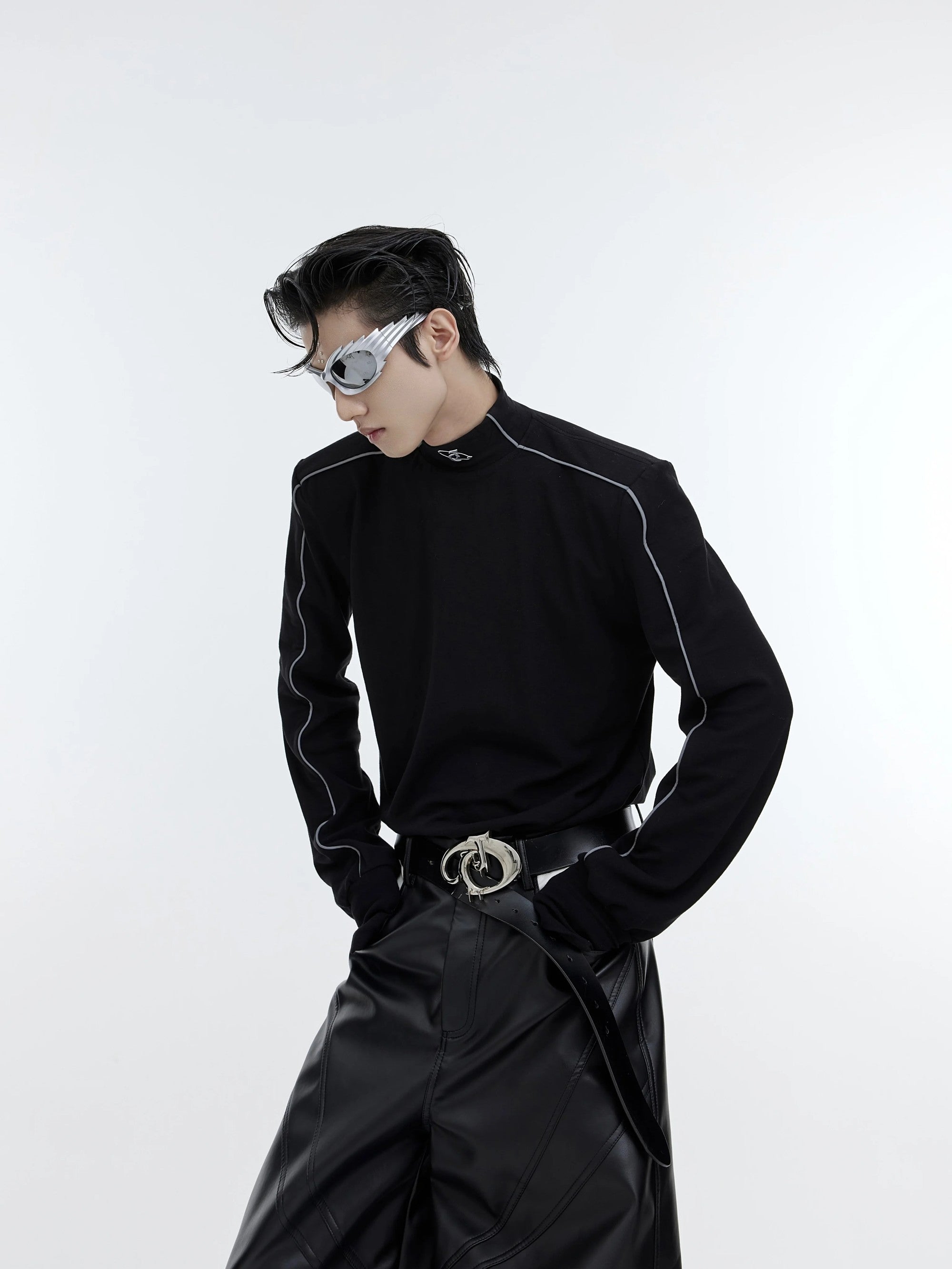 Close up of the metallic logo design on the chest