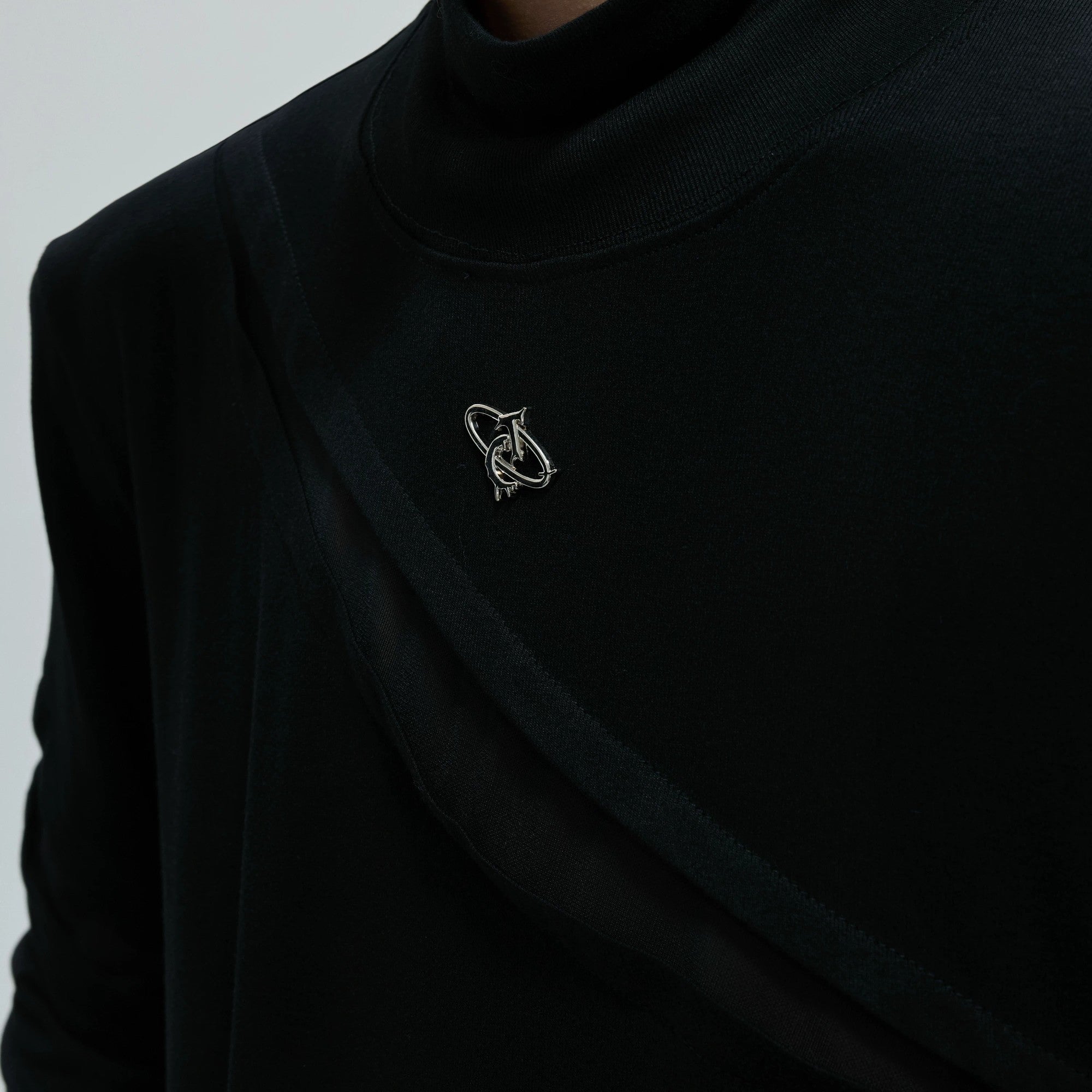 Detailed view of deconstructed stitching and cut-out design