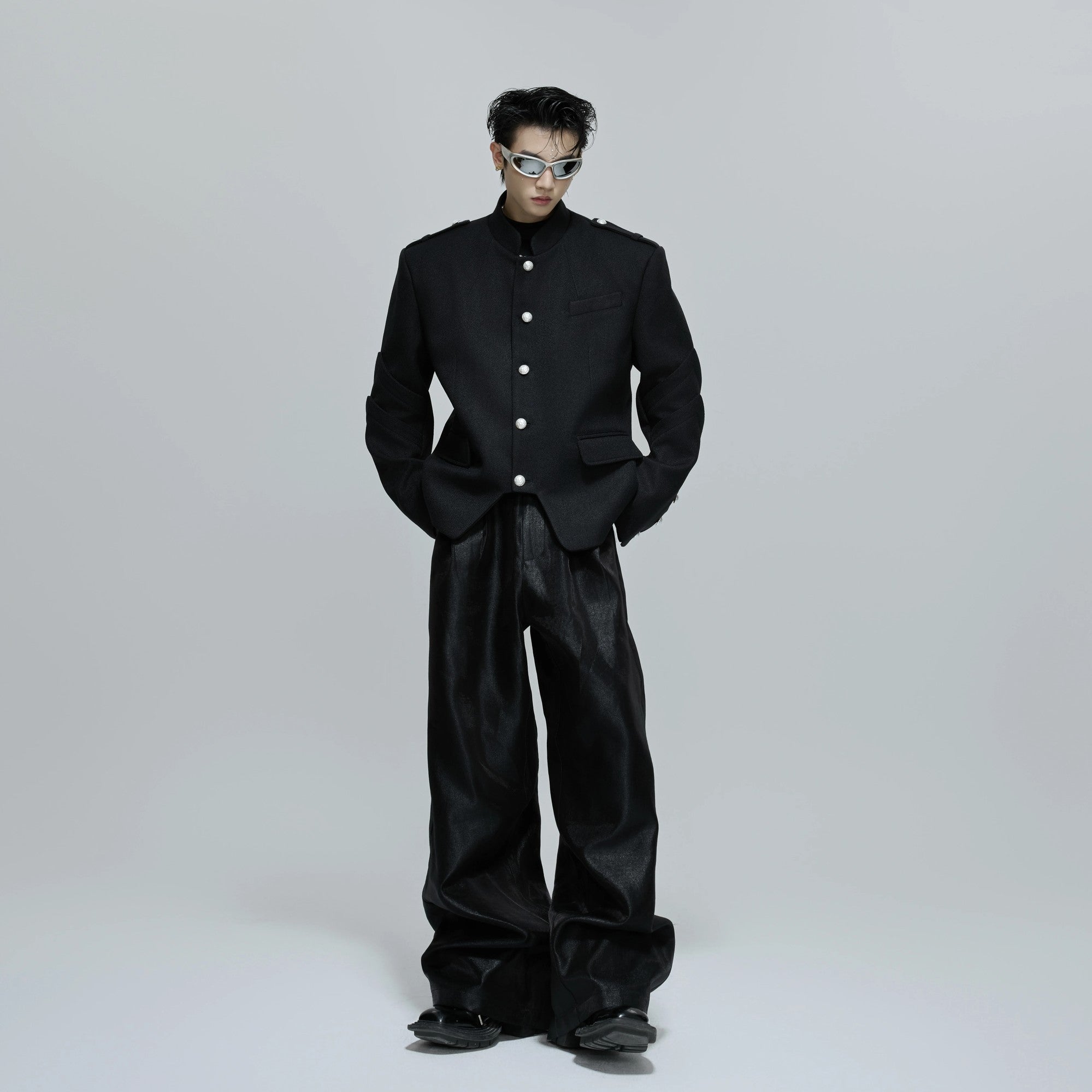 Back profile showing the complex multi-panel construction of the jacket