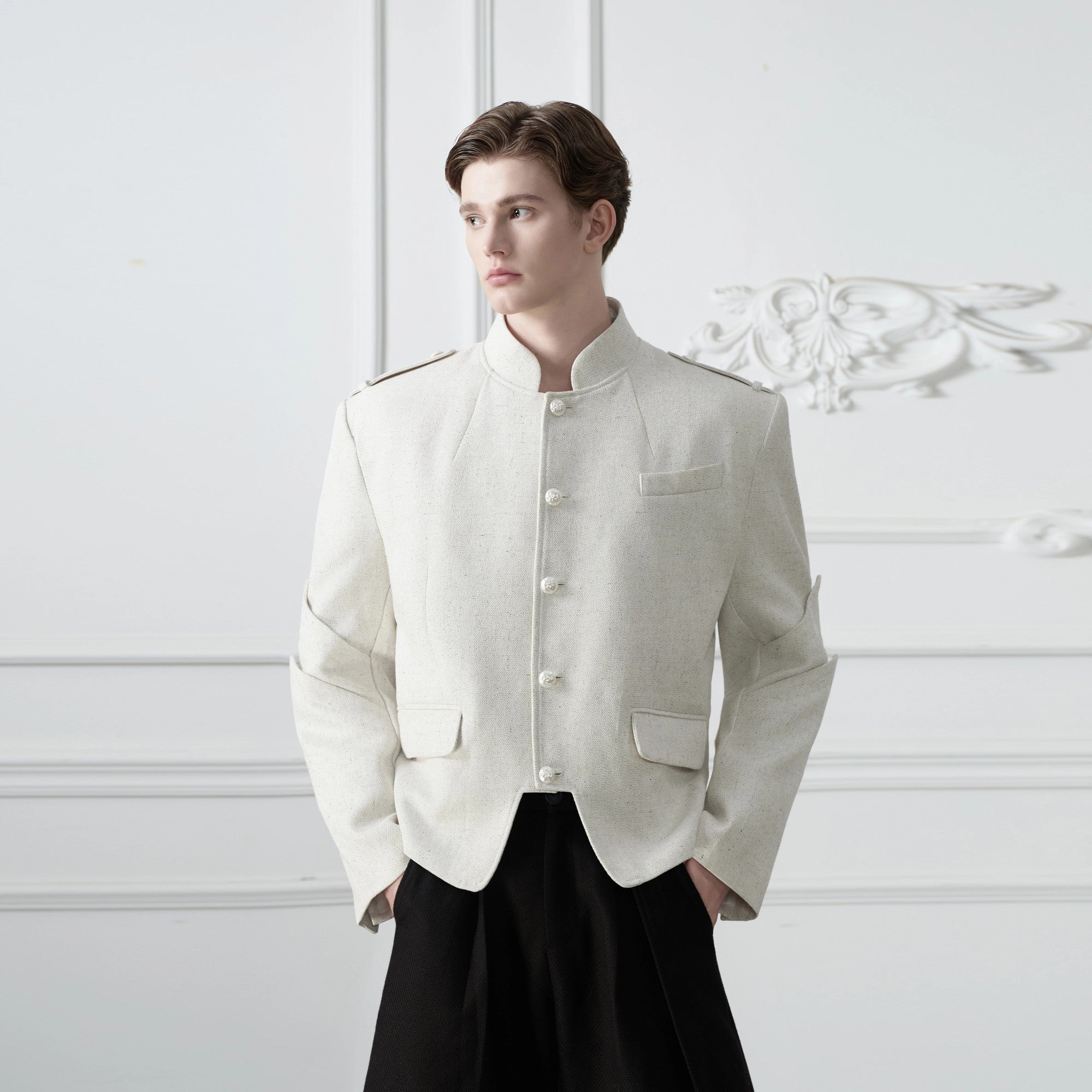 Full lookbook shot of the deconstructed blazer with baggy pants