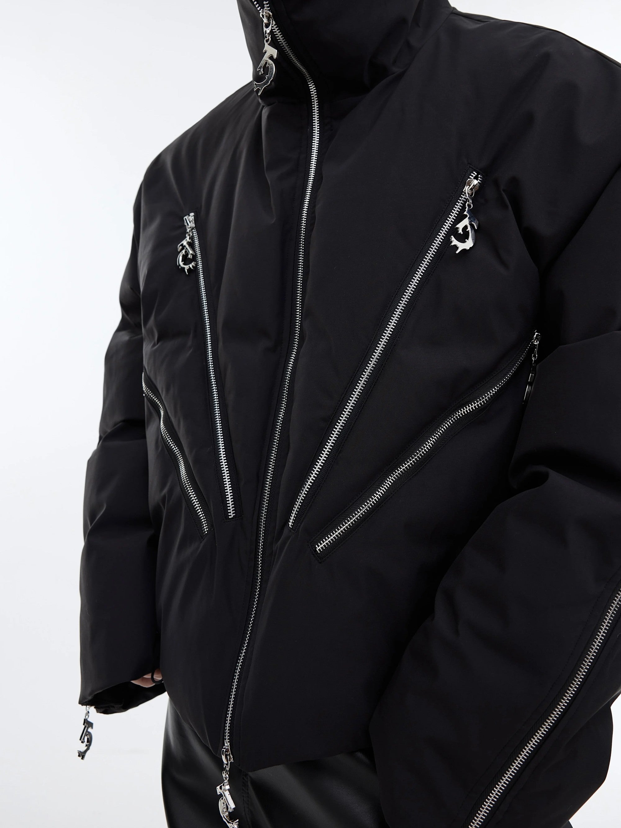 Back view of short baggy streetwear puffer jacket in black