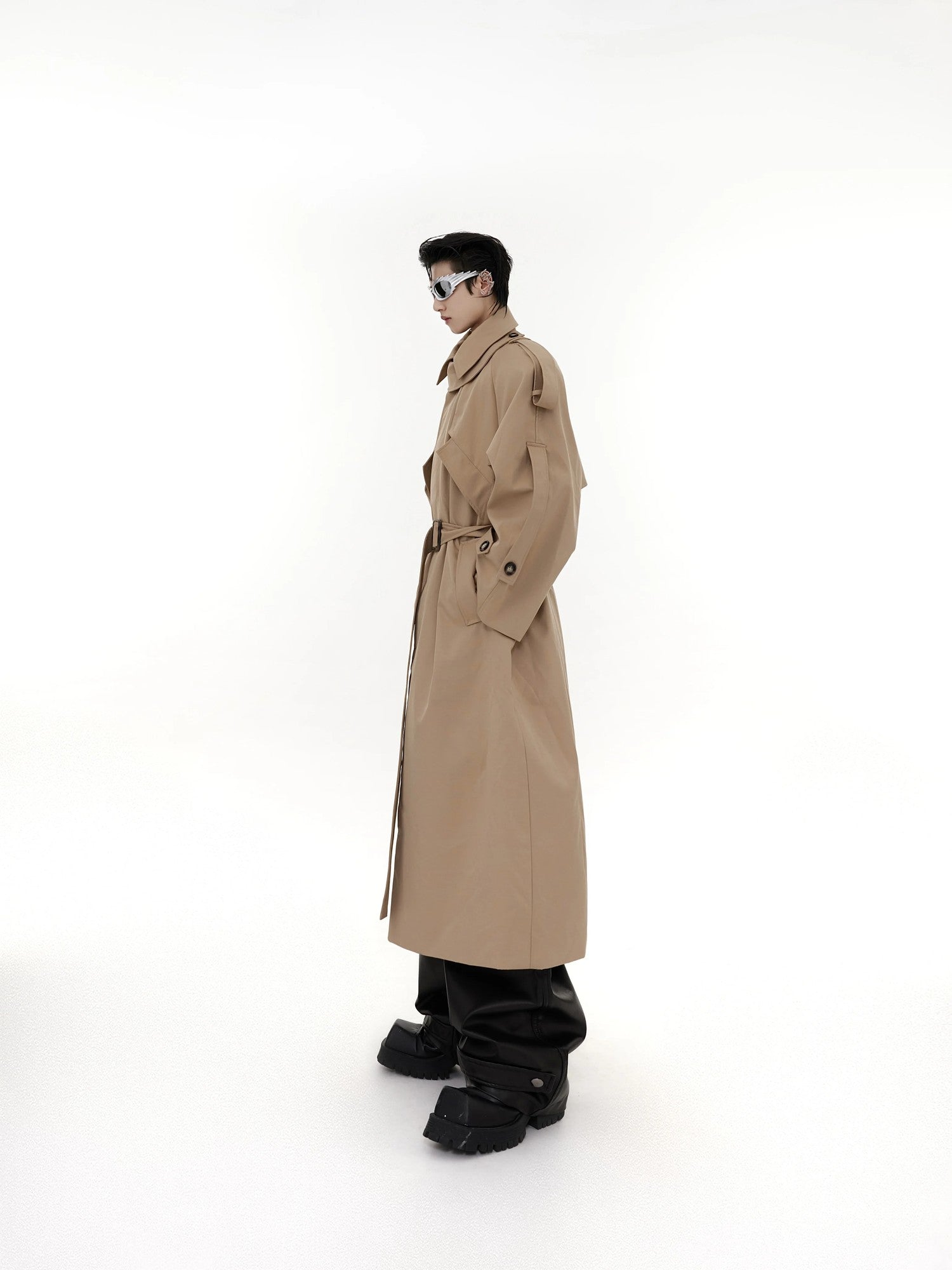 Back view of a loose fit long streetwear coat with premium stitching