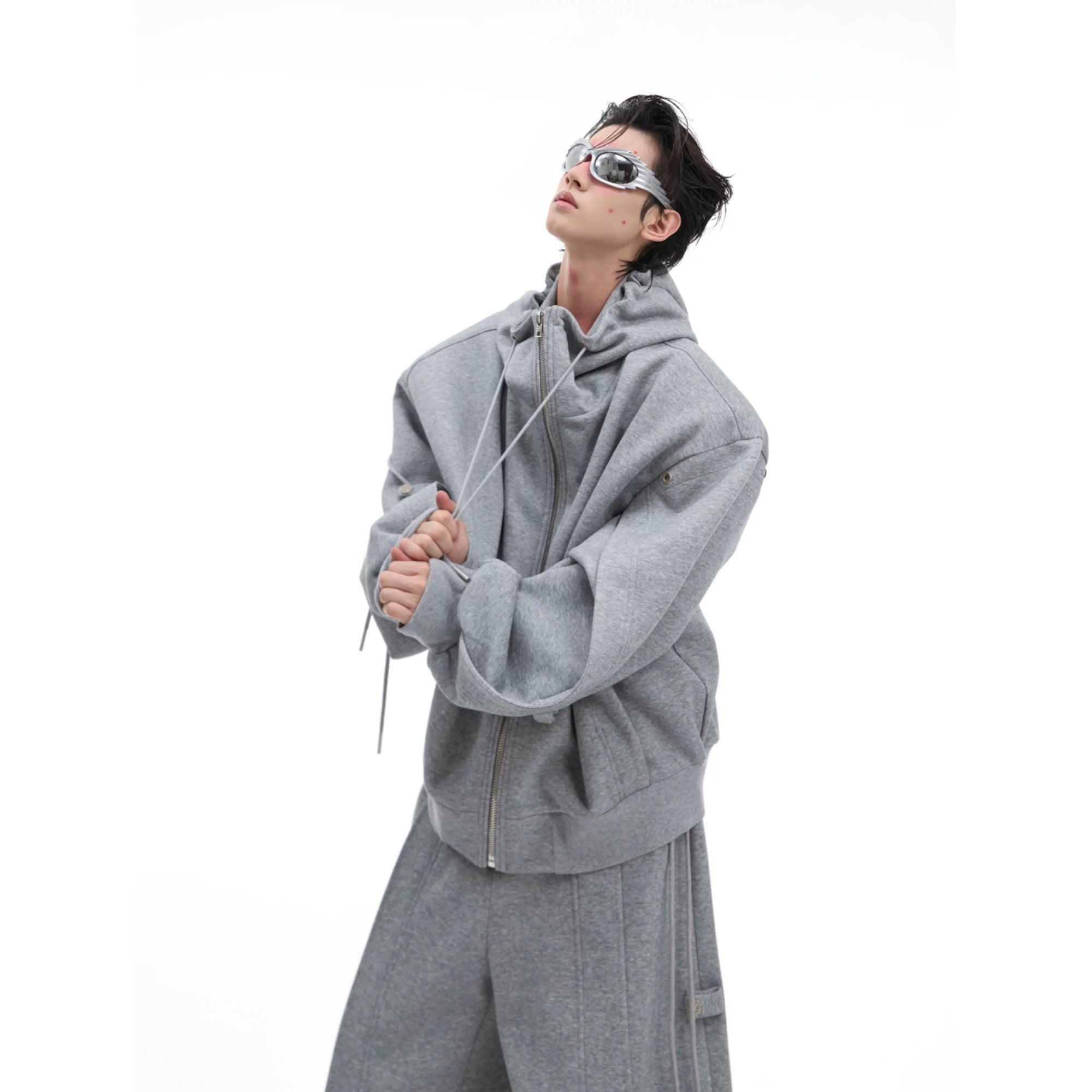 Gray deconstructed oversized zip-up hoodie with layered drawstring sleeves