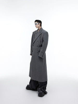 Close up of double-breasted closure and lapel on a gray wool overcoat