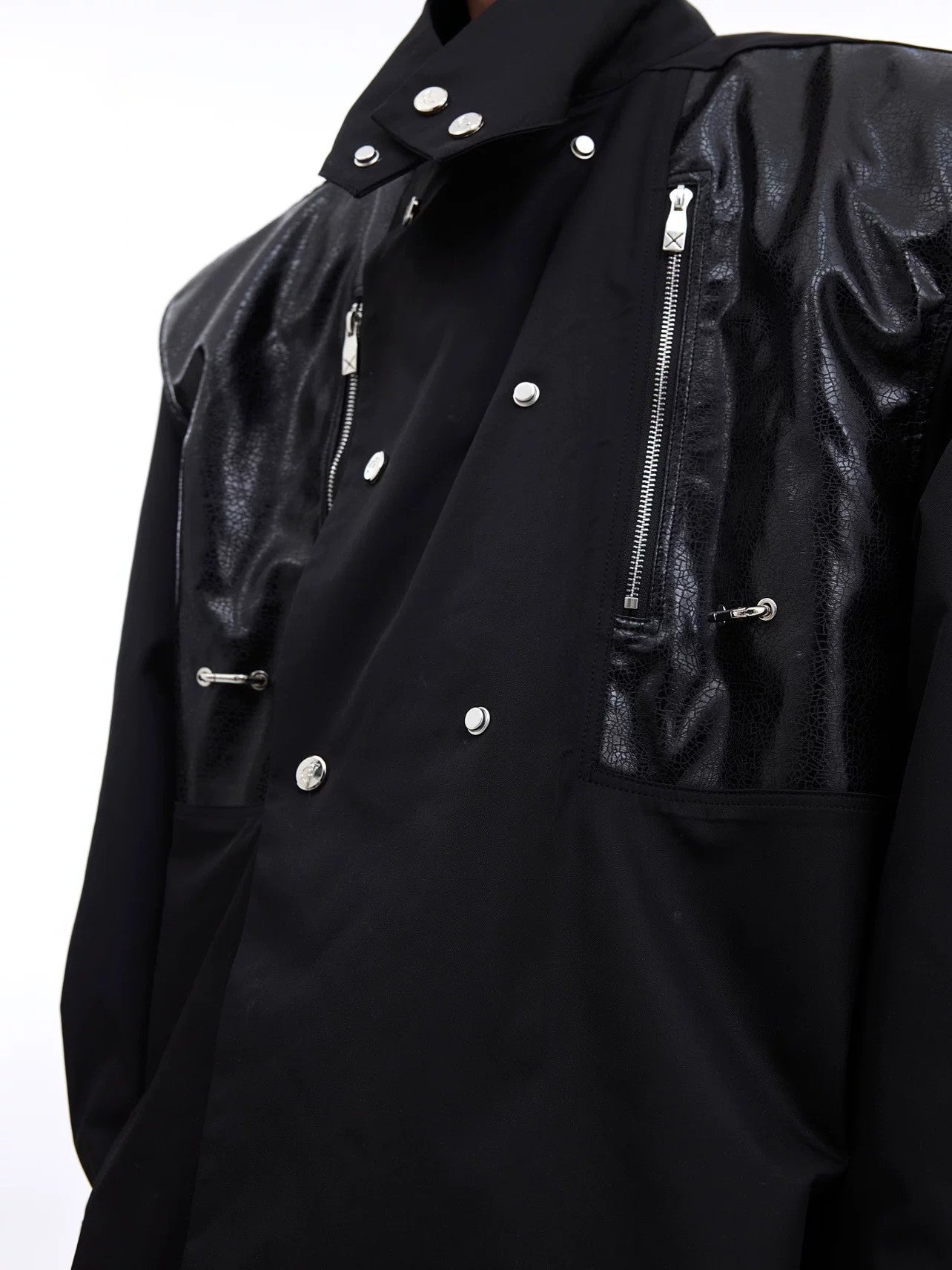 White deconstructed leather shirt styled with wide-leg pants