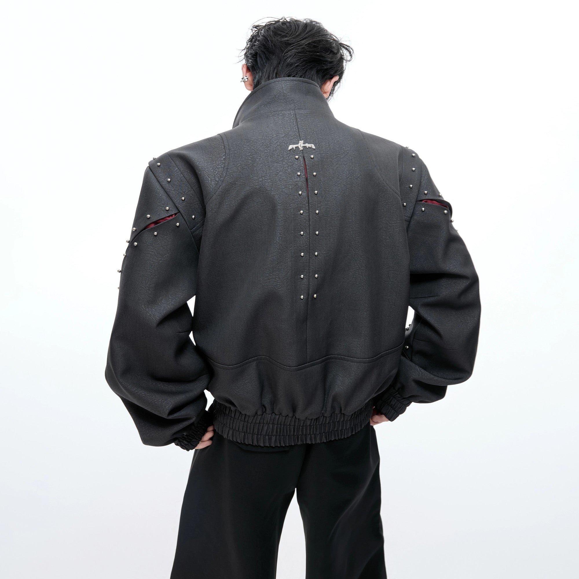 Front view of gray deconstructed rivet stand collar jacket