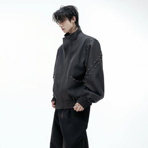 Back view showing signature hardware and loose fit