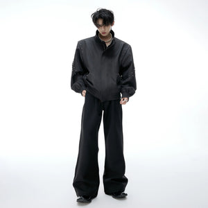 Detailed shot of elastic cuffed sleeves and hem design