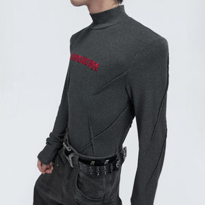 Close up of the white deconstructed turtleneck embroidery detail