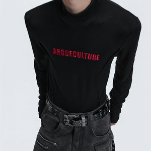 Male model wearing gray deconstructed turtleneck in an urban setting