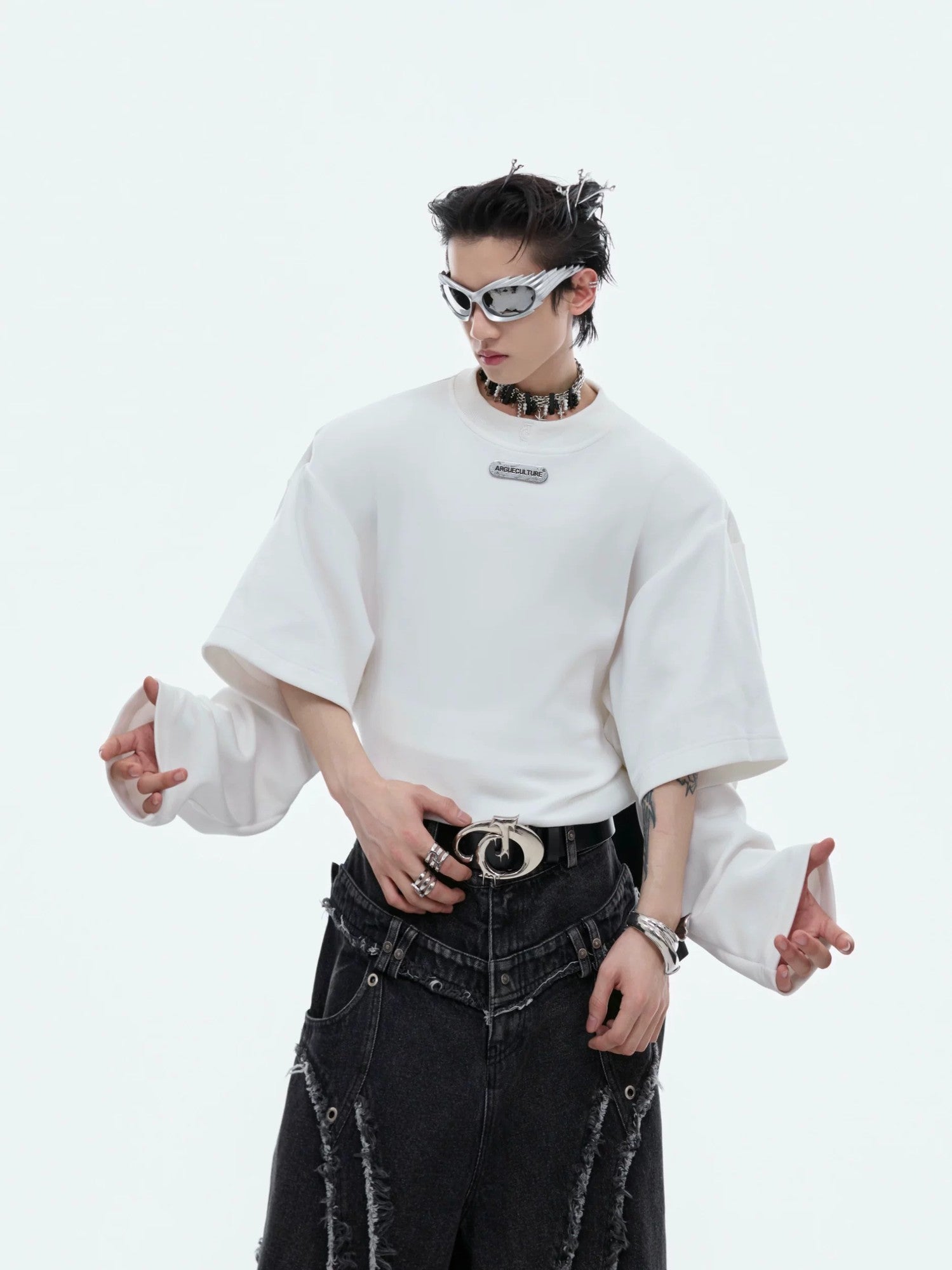 Gray oversized deconstructed sweatshirt showing layered sleeve detail