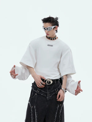 Gray oversized deconstructed sweatshirt showing layered sleeve detail