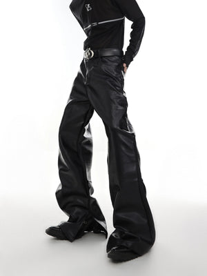 Front view of men's deconstructed black leather flare pants with ribbed details