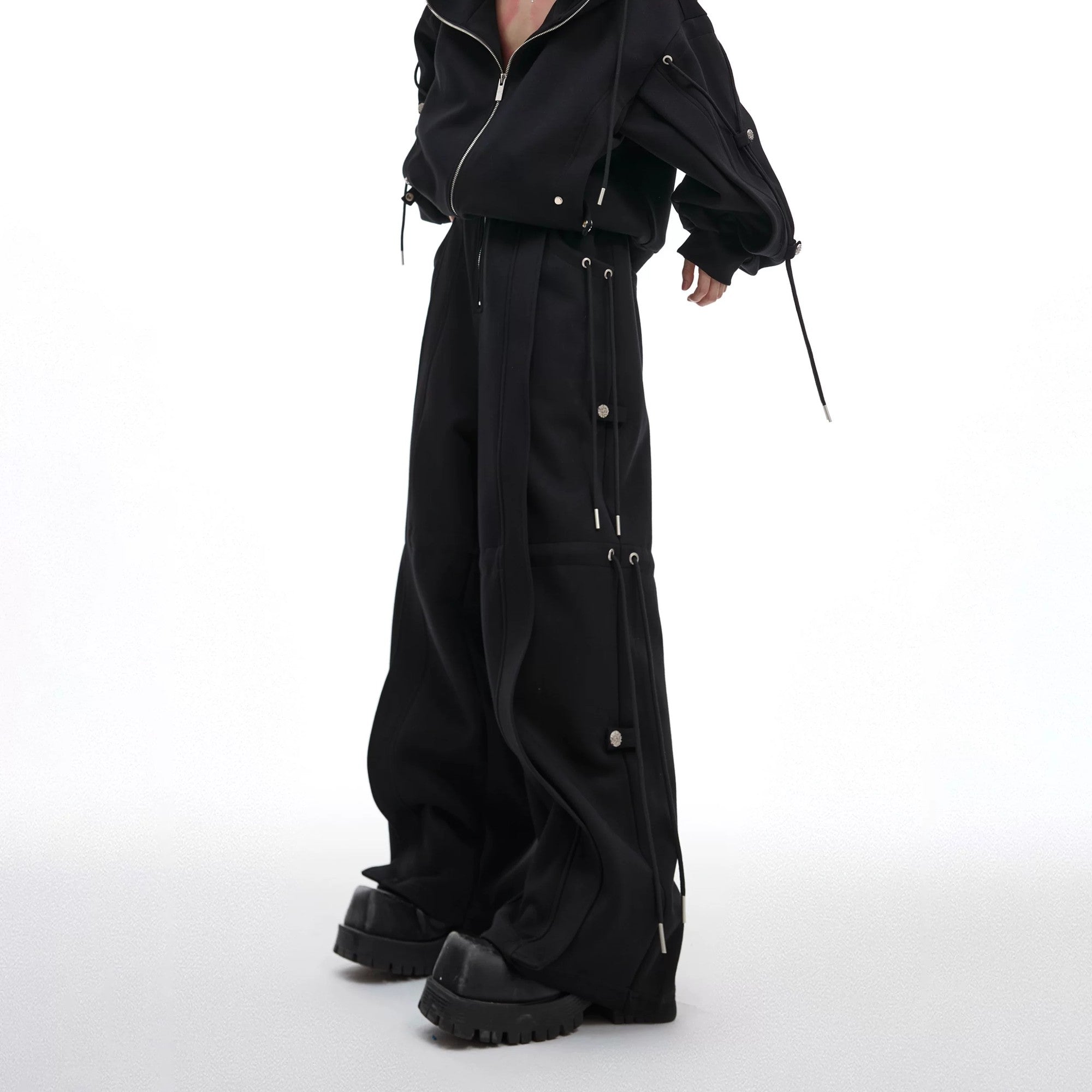 Black deconstructed baggy sweatpants with drawstring details