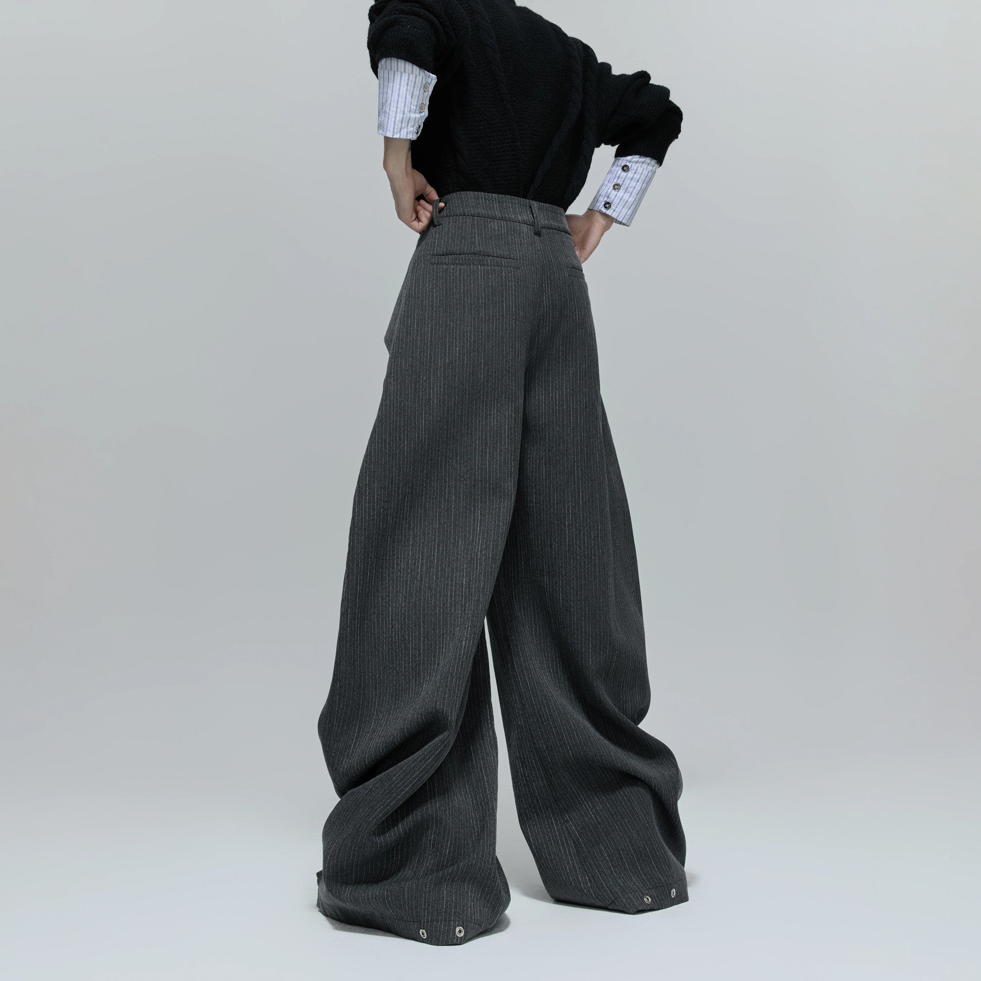 Close up of the deconstructed stitching and vertical stripe texture