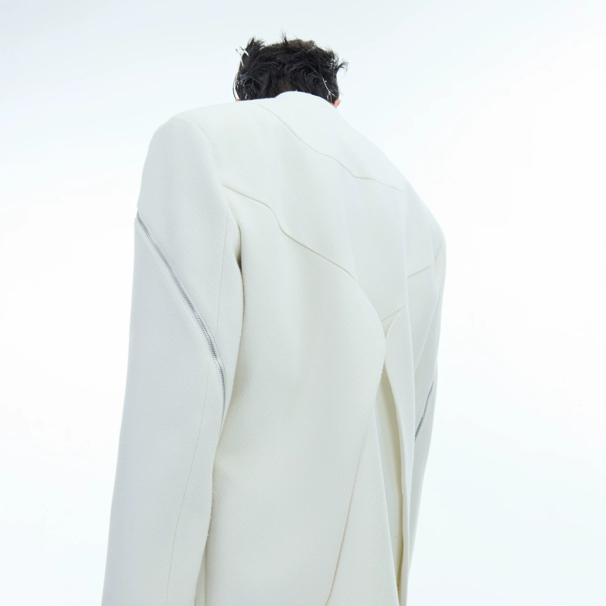 Back view of the oversized twill blazer showing the center vent design
