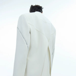 Back view of the oversized twill blazer showing the center vent design