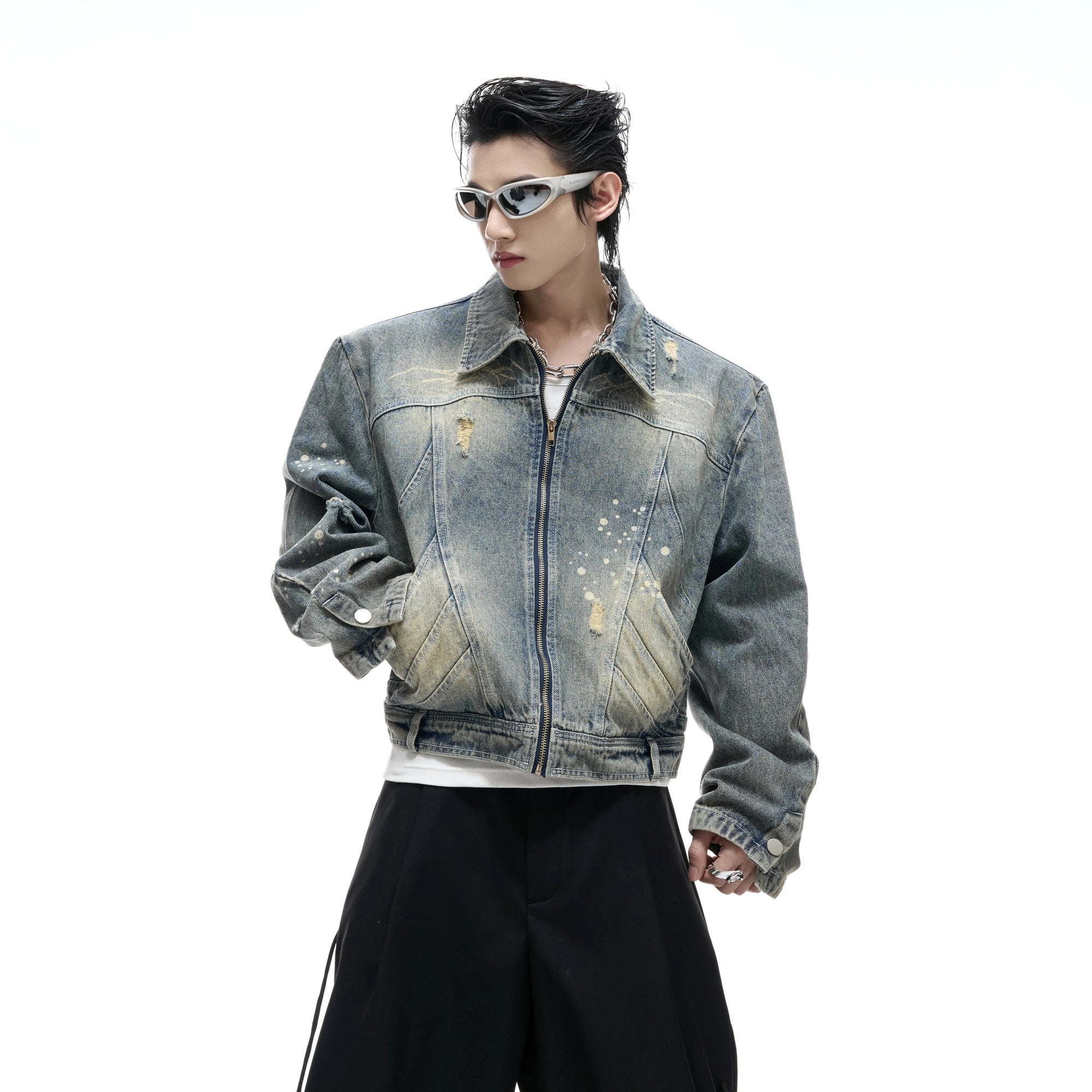 Back view showing the vintage wash and deconstructed denim texture