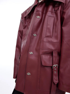 Back view of the oversized distressed leather jacket showing straight hem