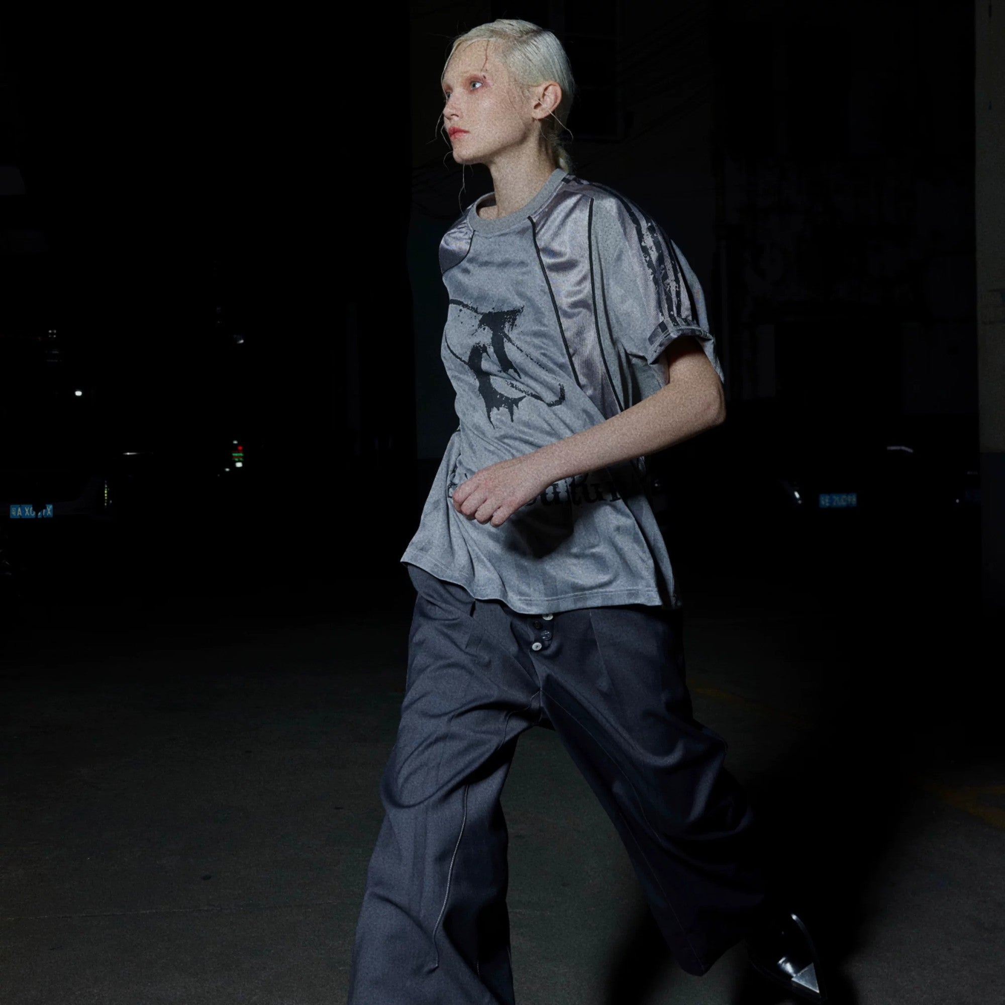 Back view showing number 8 distressed print on streetwear jersey