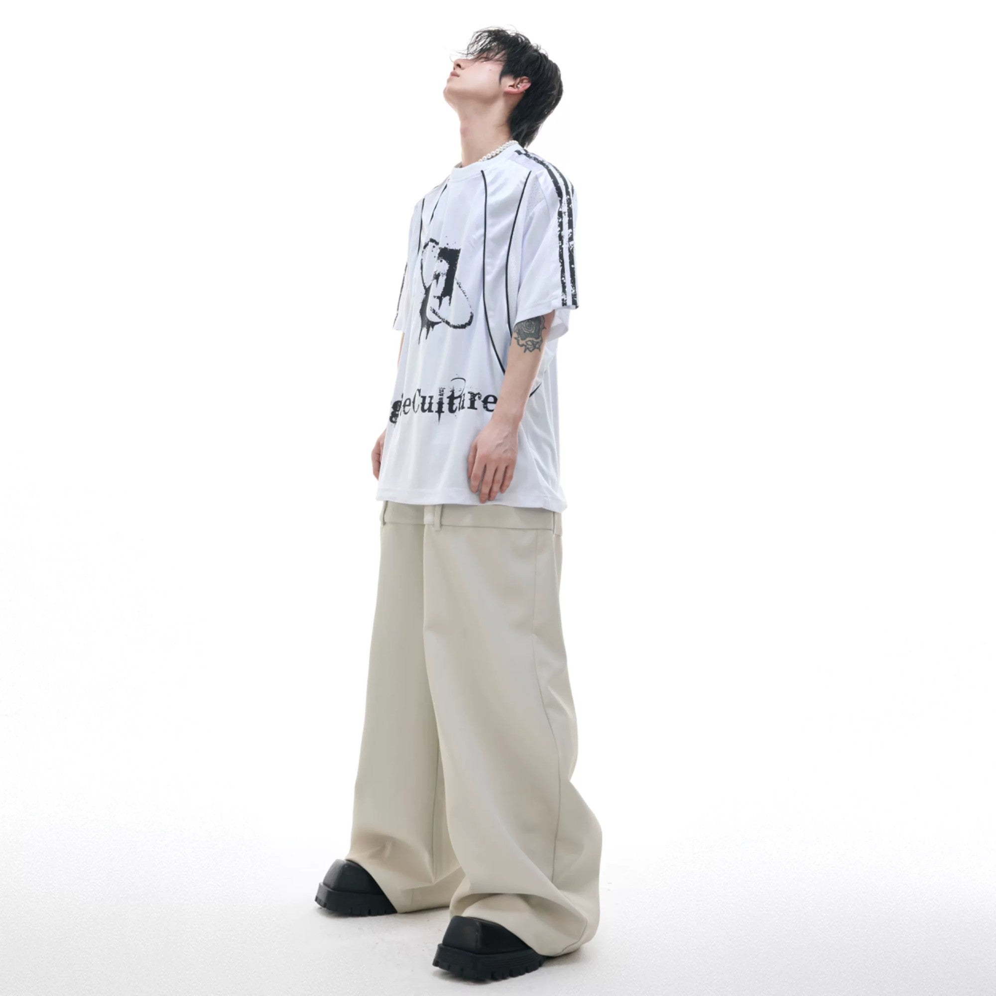 Close up of paneled stitching and fabric texture on jersey tee