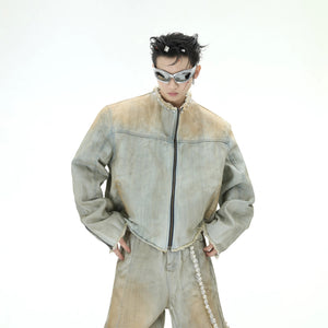 Model wearing full distressed pearl denim set in urban setting