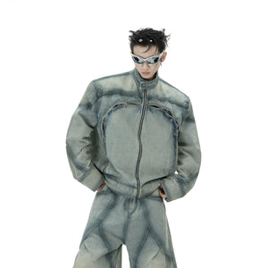 Front view of a vintage washed blue denim jacket and pants set with metal rings