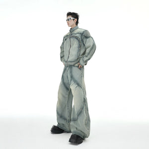 Close-up of the metal ring buckle and irregular wash on the denim jacket