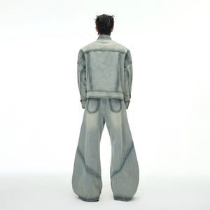 Back view of the stand collar distressed denim jacket with arc seams