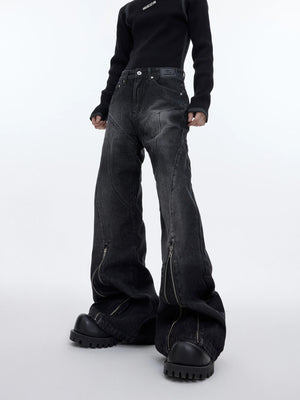 Front view of gray washed structural flared denim jeans with zipper details