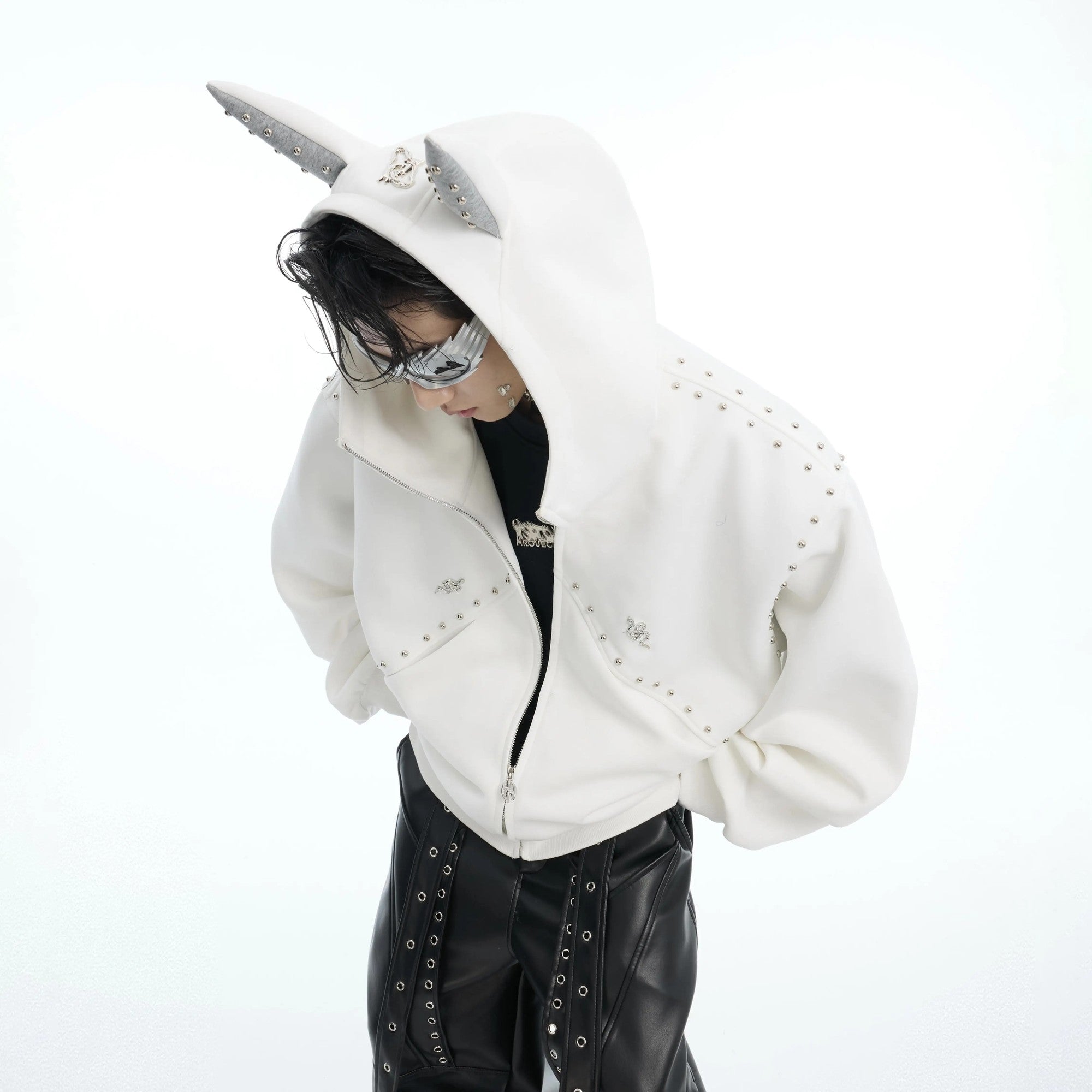 Gray oversized hoodie with metal rivet details and wing stitching