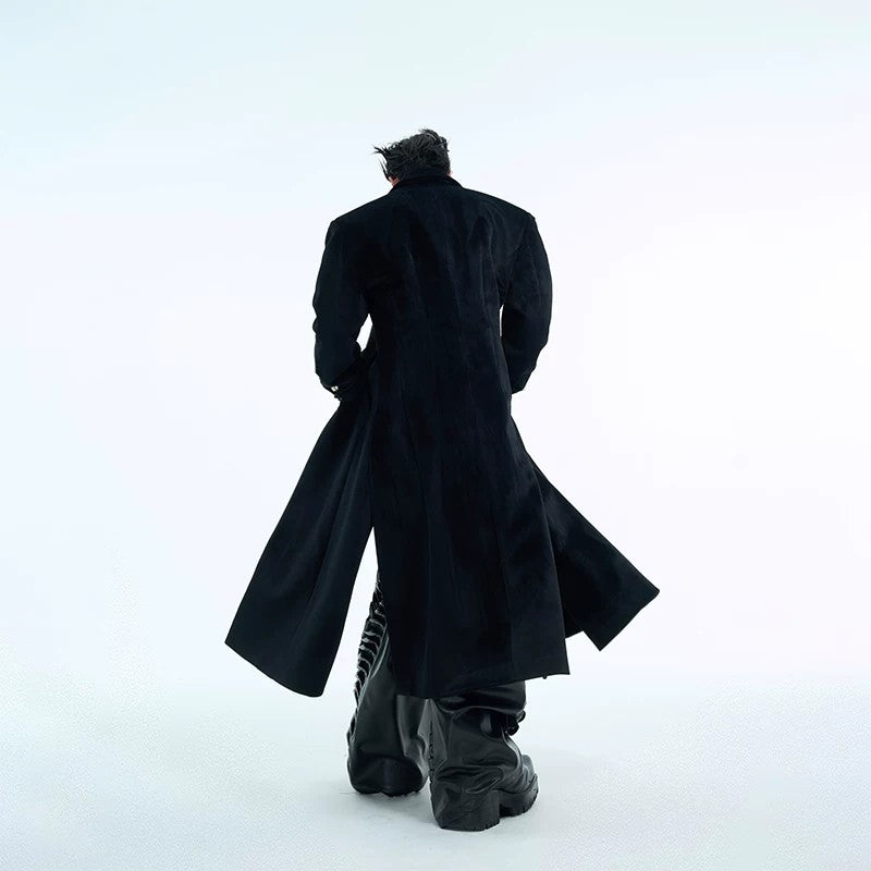 Close-up of silver metal buttons on a heavyweight woolen coat