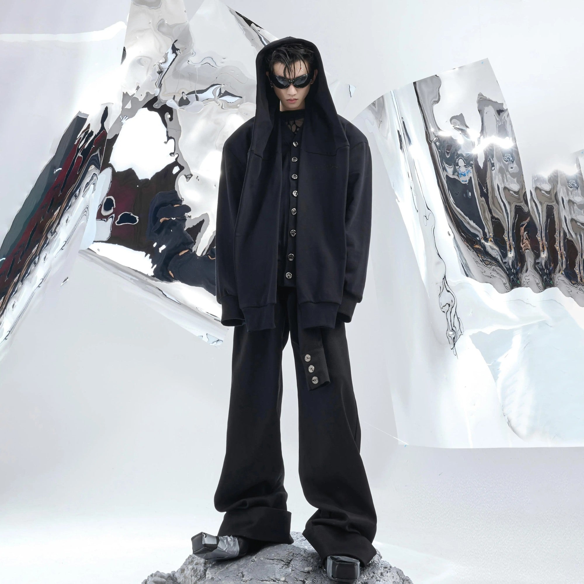 Lifestyle shot of the layered streetwear cardigan in an urban setting