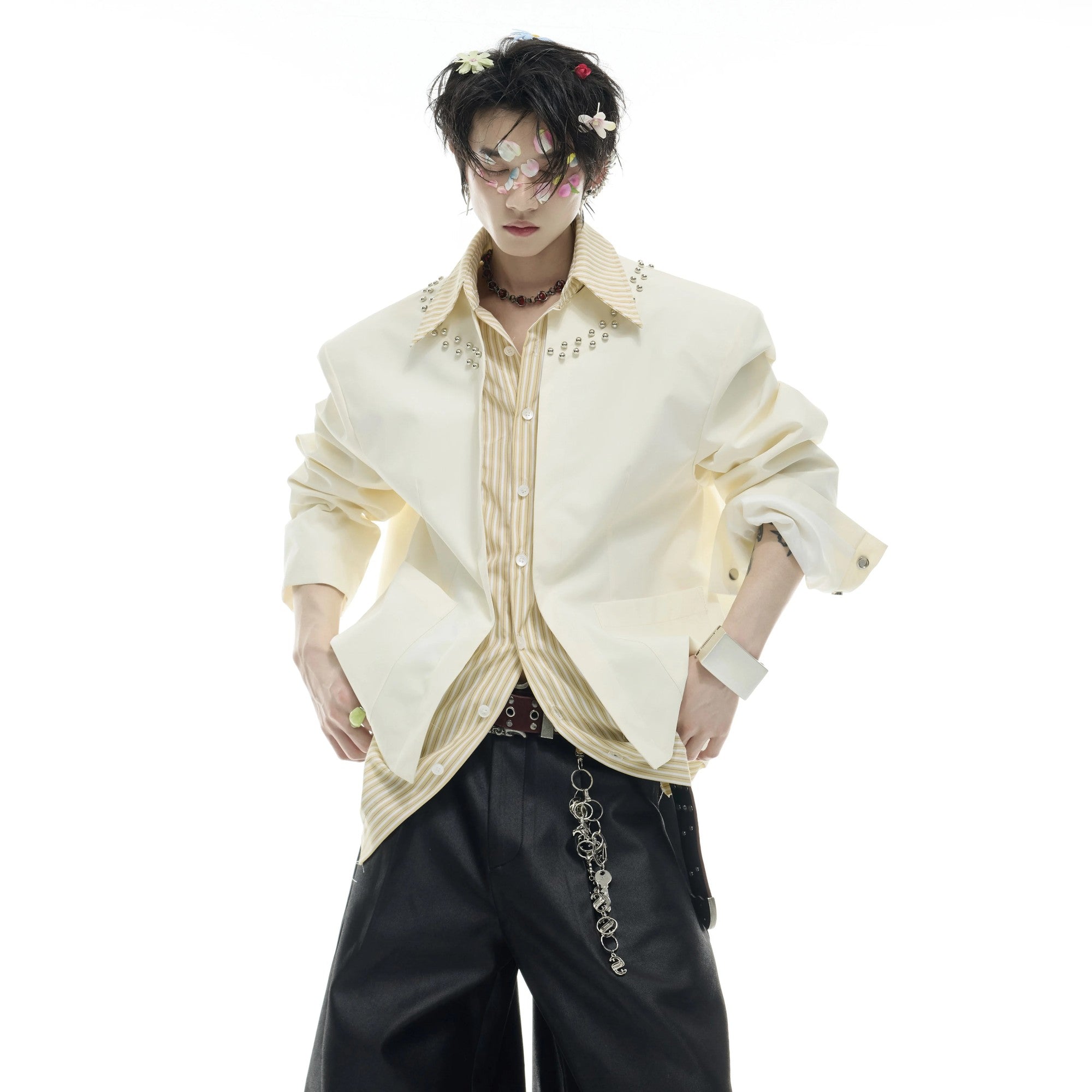 Back view of black deconstructed streetwear shirt with loose fit