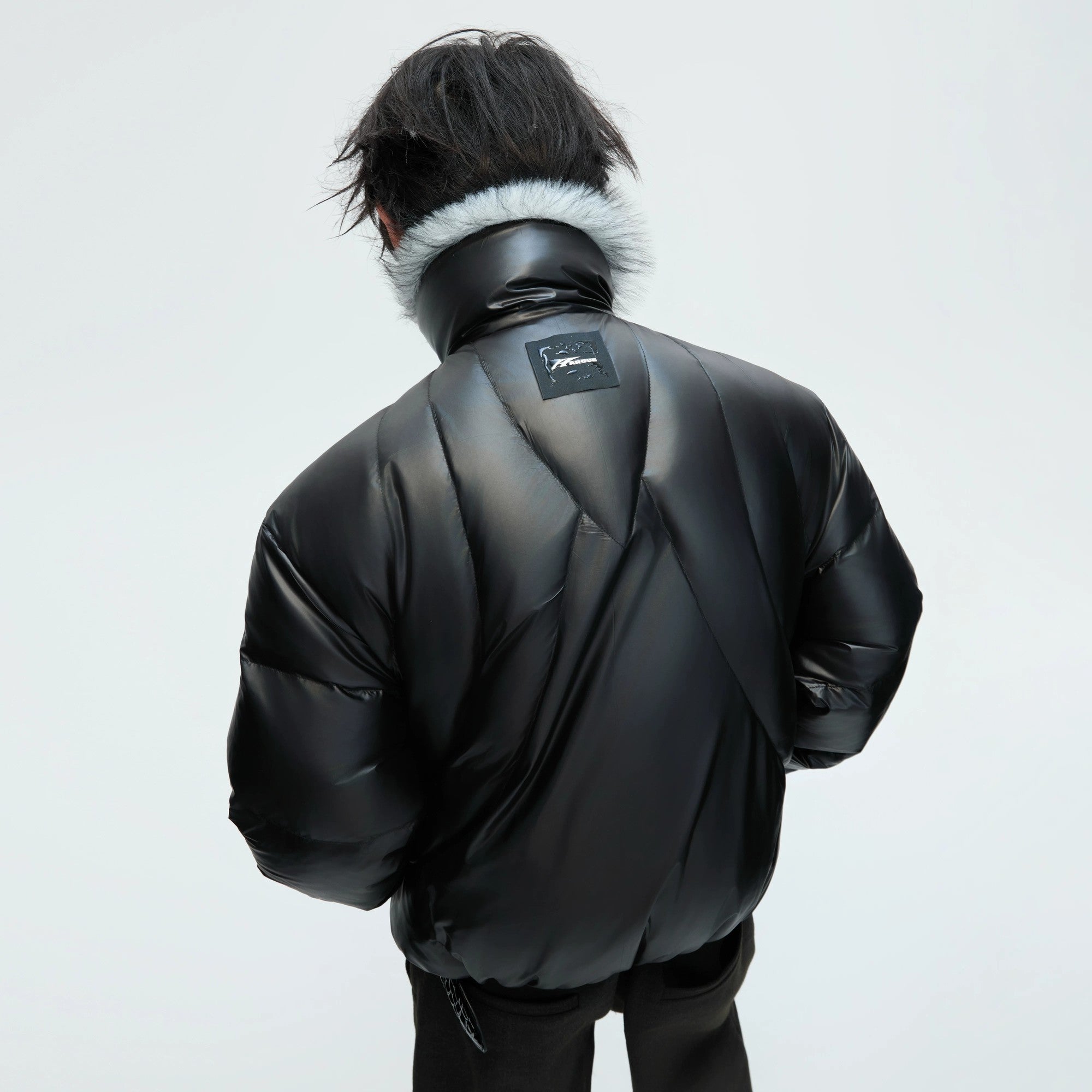 Close-up of high-quality faux wolf fur collar and tech fabric