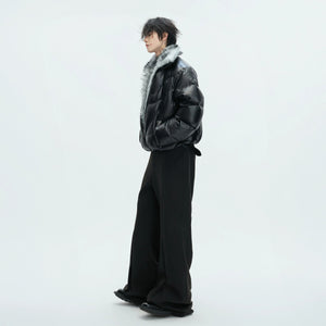 Lifestyle shot of black winter puffer jacket in urban setting