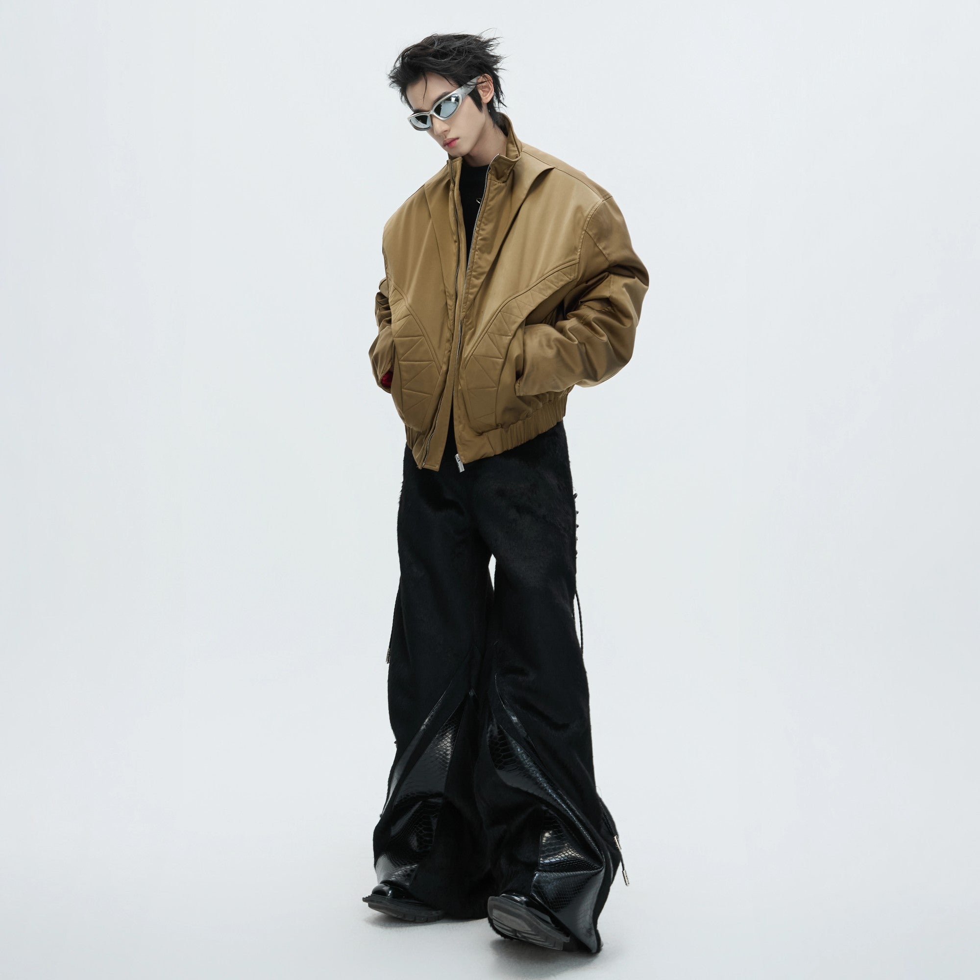 Back view of the heavyweight street-style trousers showing the premium drape.
