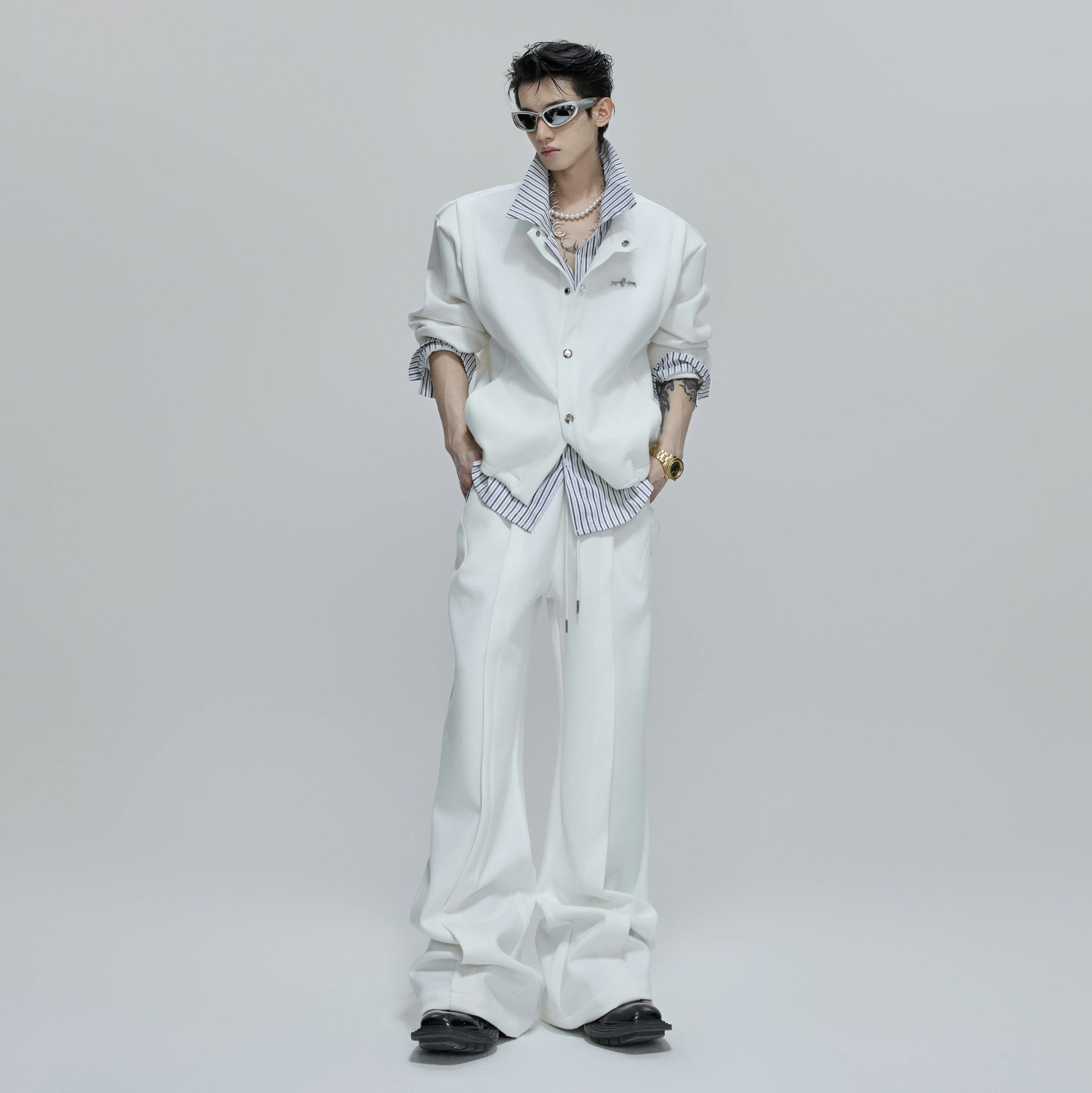 Front view of the gray faux two-piece striped cardigan sweatshirt