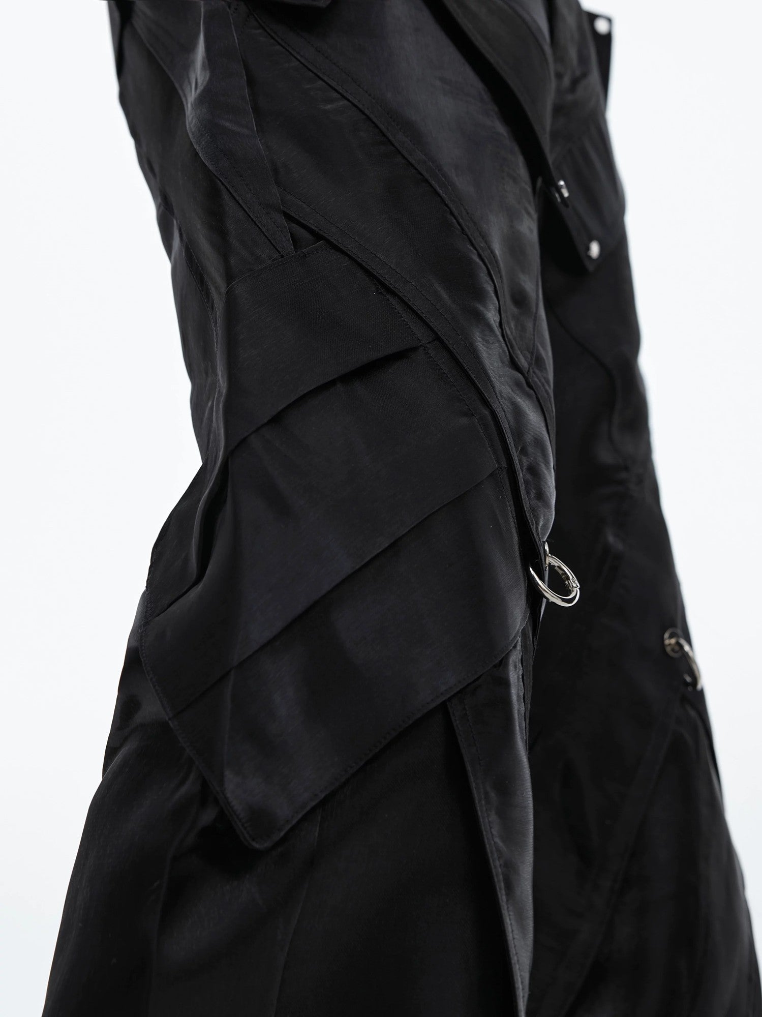 Back view of the loose fit flared leather trousers for streetwear styling.