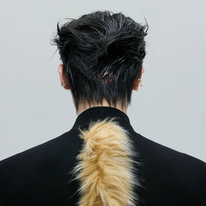 Close up of silver hardware and raccoon fur texture on shoulder