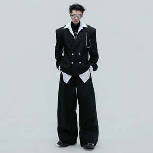Front view of black glitter stripe cinched blazer with detachable chain