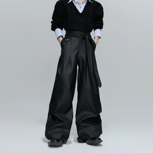 Front view of glossy pleated straight-leg trousers in gray