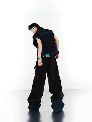 Close-up of vintage washed denim fabric with spray paint design details