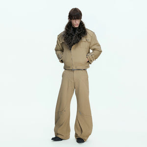 Model wearing the loose fit washed canvas jacket in a street setting.