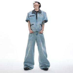 Front view of heavy washed distressed denim jacket with leather collar