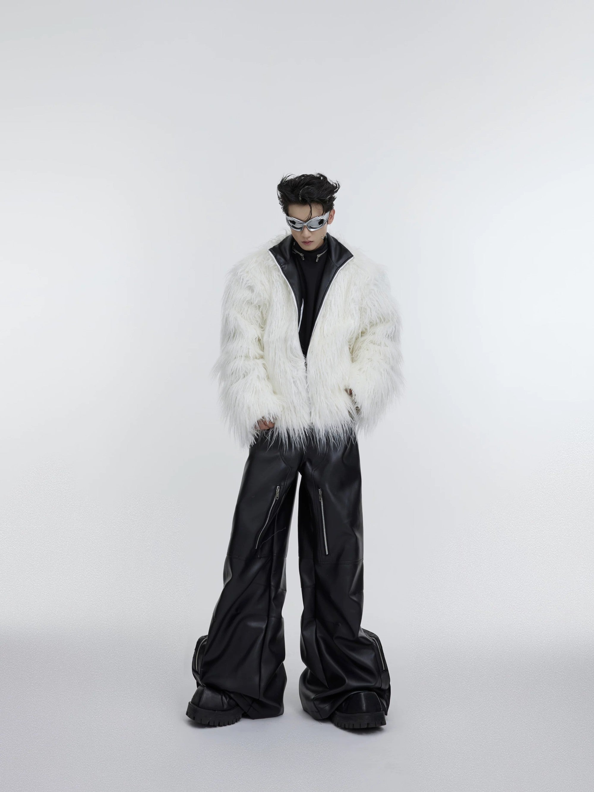 Detail of the lapel collar and zipper closure on the faux fur coat