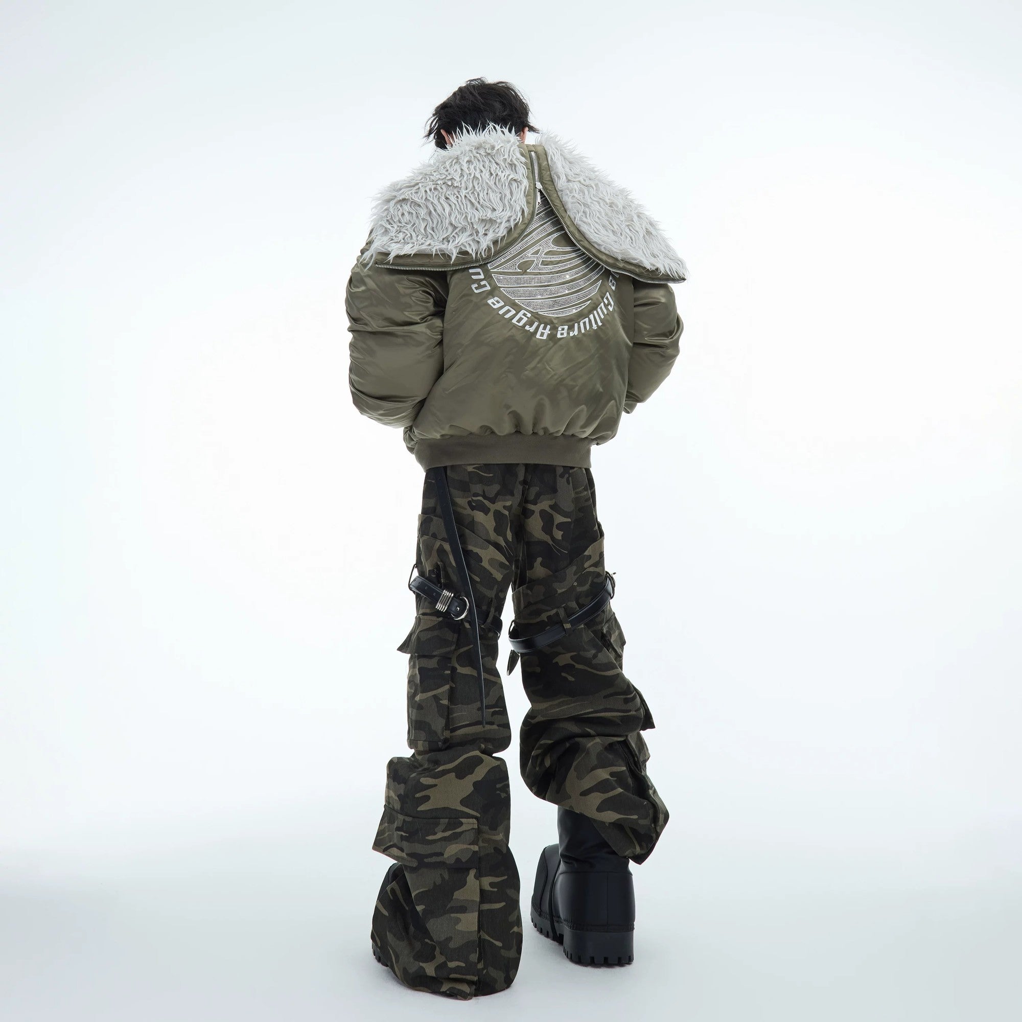 Brown colorway of the heavyweight plush bomber jacket worn in a street setting