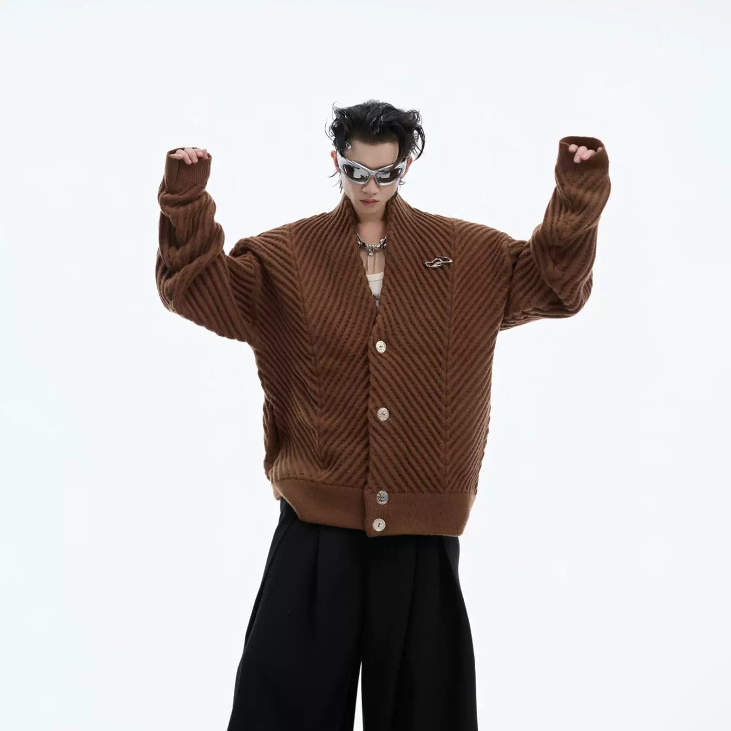 Collection of heavyweight cardigans in brown, white, and black