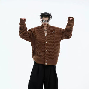 Collection of heavyweight cardigans in brown, white, and black