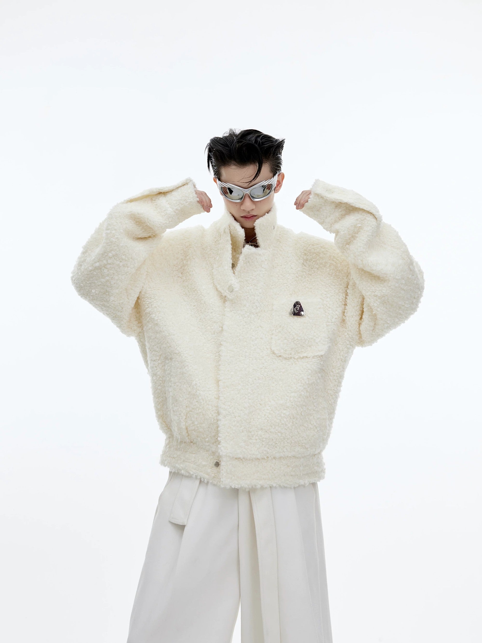 Side view of gray deconstructed woolen jacket with metal details